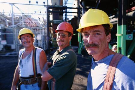 Three construction workers wearing hard hats — sample frame from the Roboflow Universe Construction Site Safety dataset